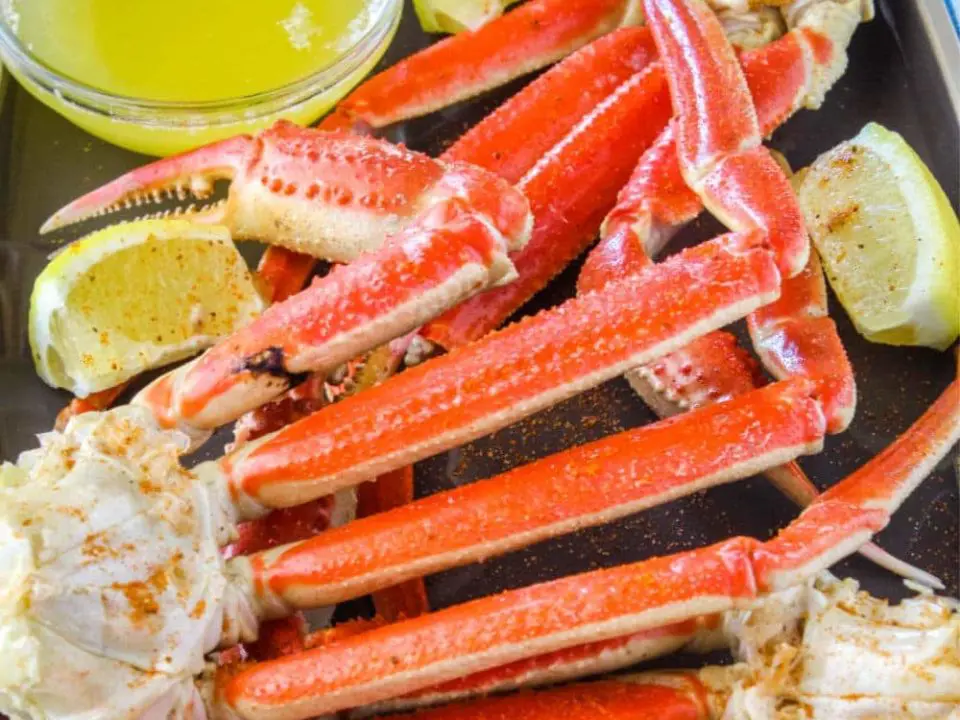 bright red crab legs and melted butter