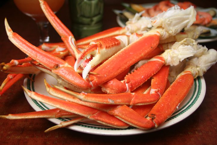 plate overflowing with crab legs